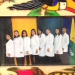 The first Adelante Mujer doctorstaken, asked the artist to add “Adelante Mujer” to the painted