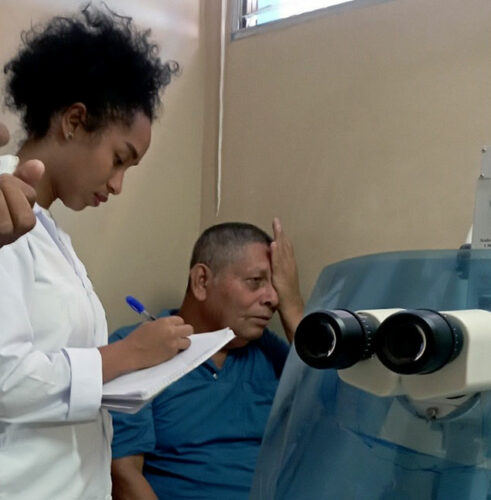 doctor performing eye exam