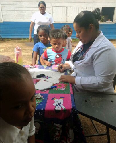 doctor traveling to communities providing care to children